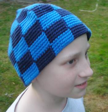 Markus Odeberg, circa 2013, in a hat crocheted by his mother