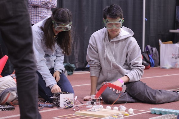 two students compete together