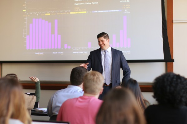 A student demonstrates his ability in data analytics at the Ohio State University Fisher College of Business' Specialized Master in Business Analytics.