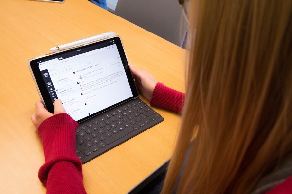 Woman using CarmenCanvas on an iPad