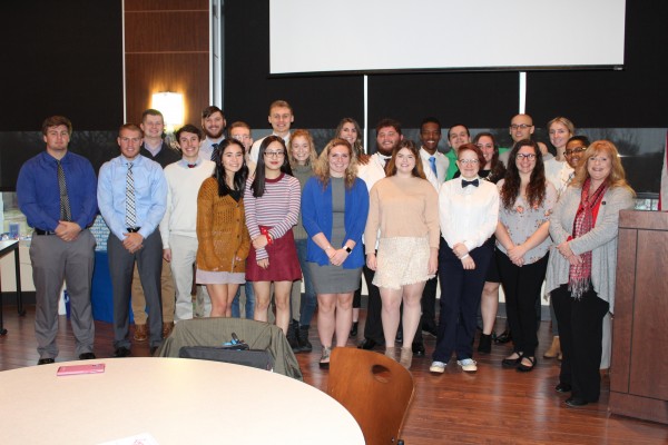 The group of students from the Pay It Forward class standing together at the funding ceremony.