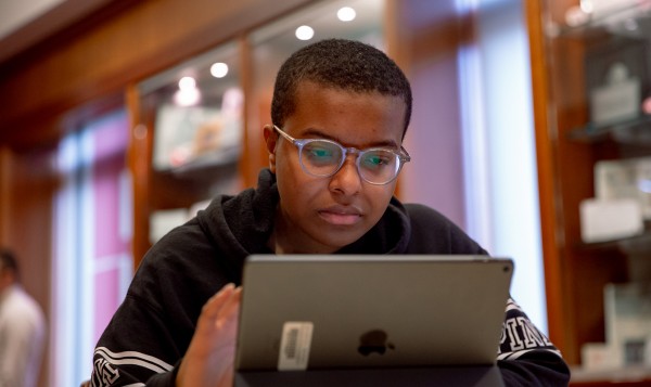 Student working on iPad