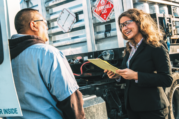 Karen consults with a team member at Airgas.